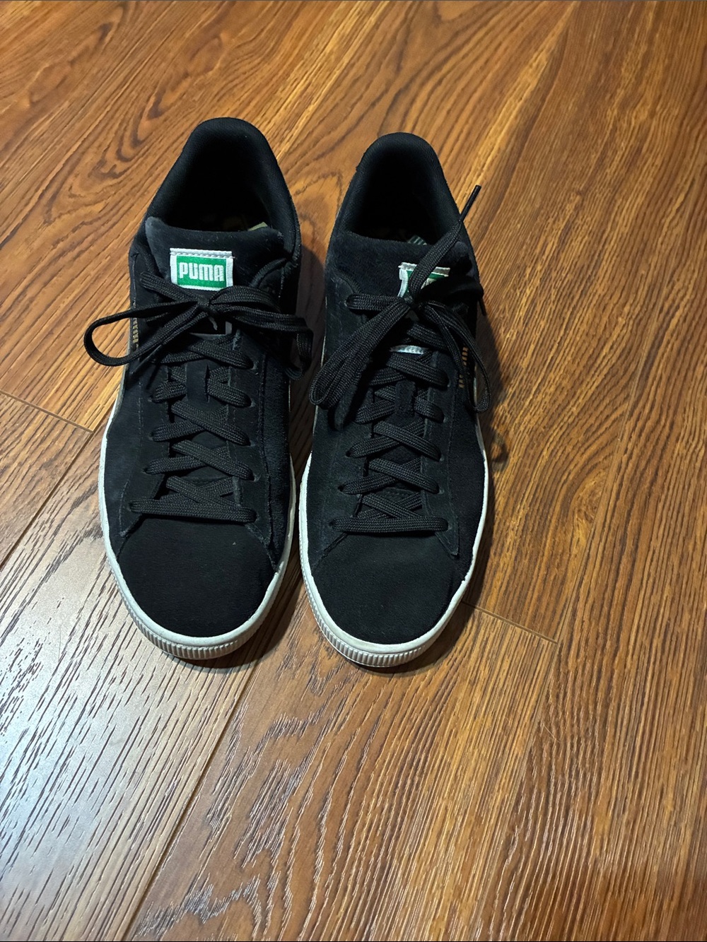 Puma Black Suede Sneakers with White Sole and Green Logo